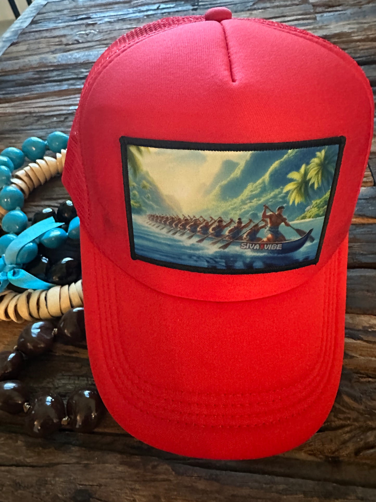 All red Fautasi foam trucker hat by Siva Vibe — fiery island look inspired by traditional Samoan pride