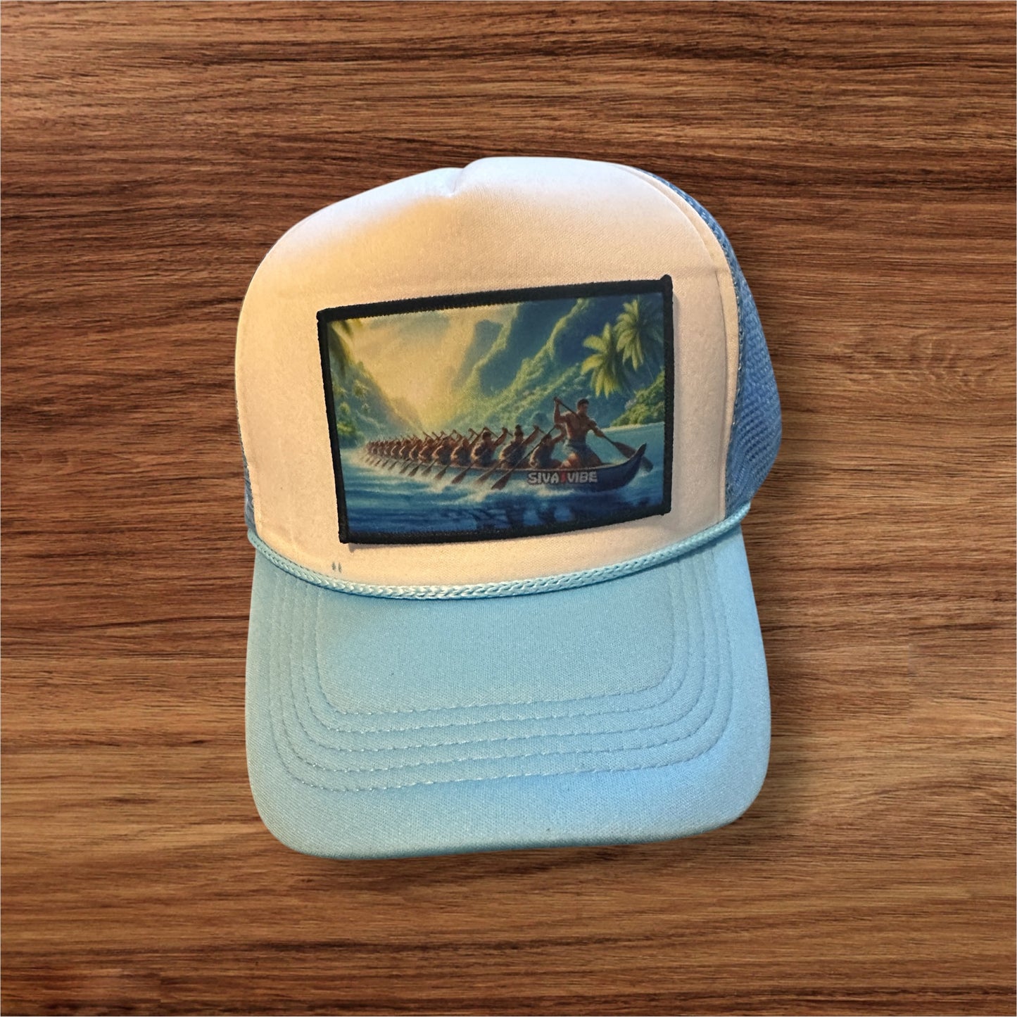 Fautasi foam trucker hat by Siva Vibe with white front and baby blue bill — clean coastal style with island roots