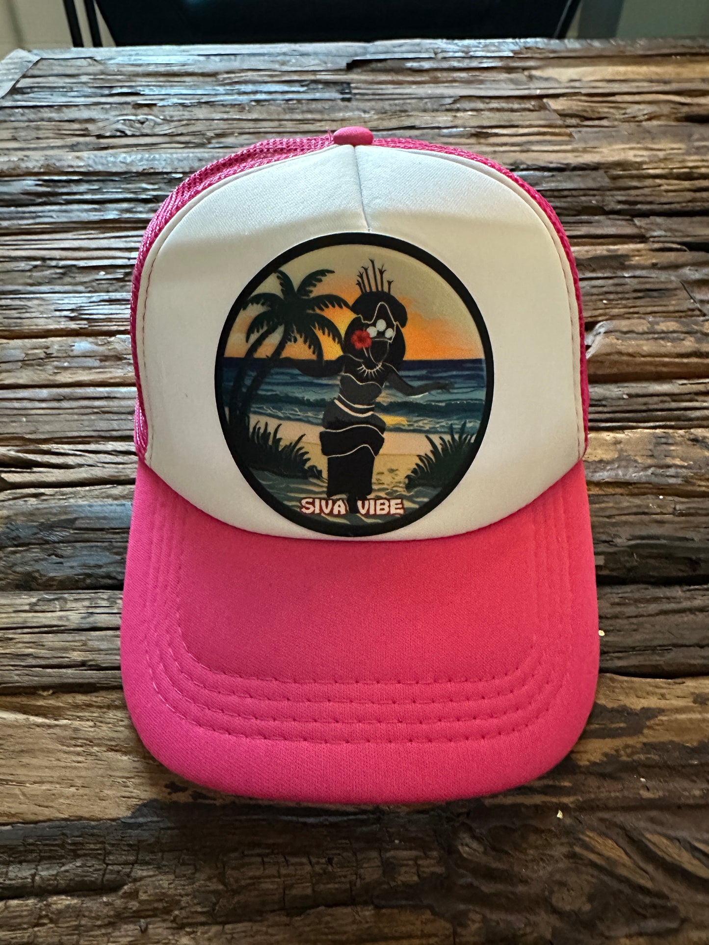 Foam mesh trucker hat by Siva Vibe featuring pink mesh and white front with Samoan Taupou embroidered patch
