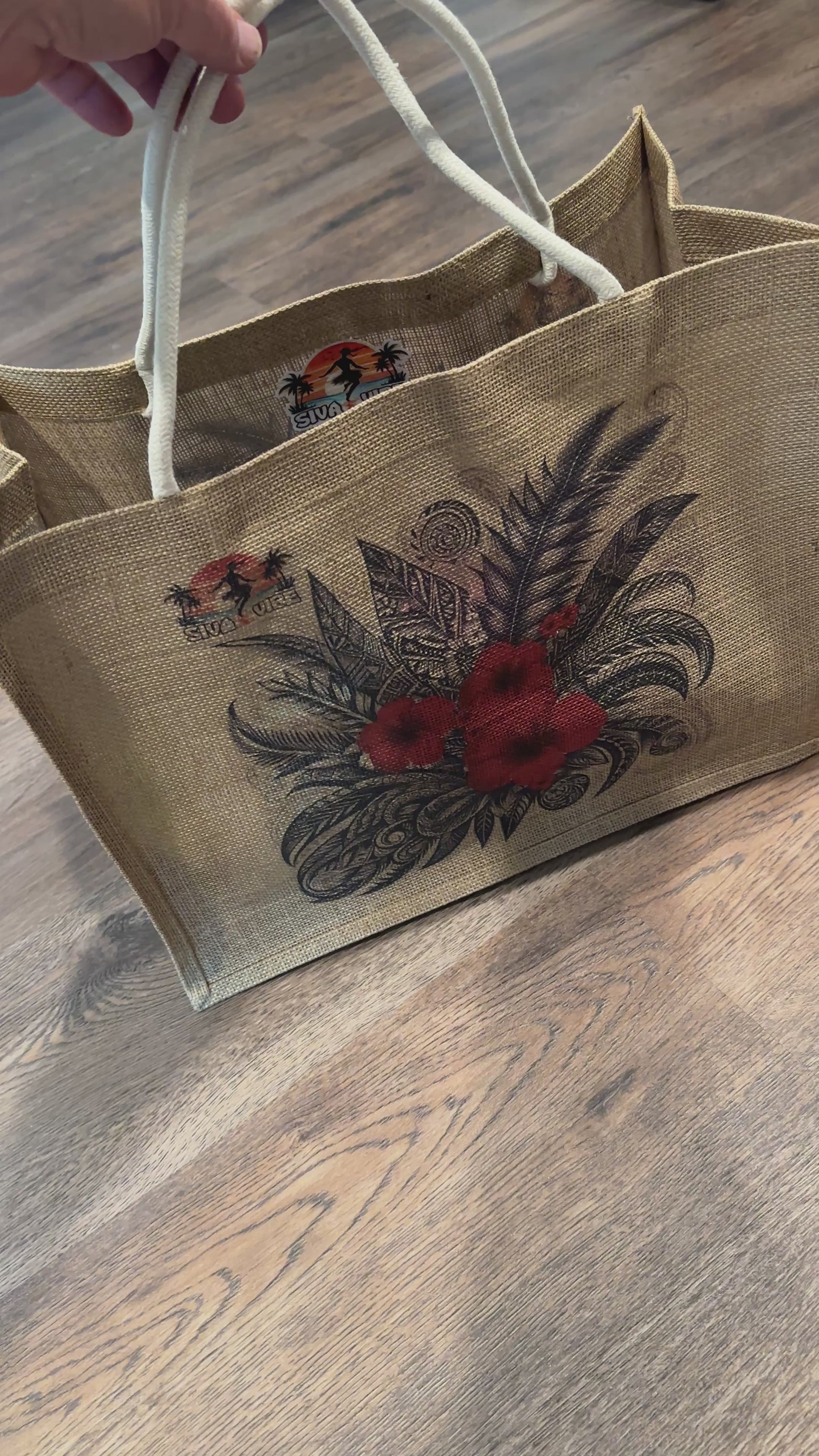 Alternate view of Siva Vibe black and red hibiscus jute bag — oversized reusable tote with island-inspired floral design