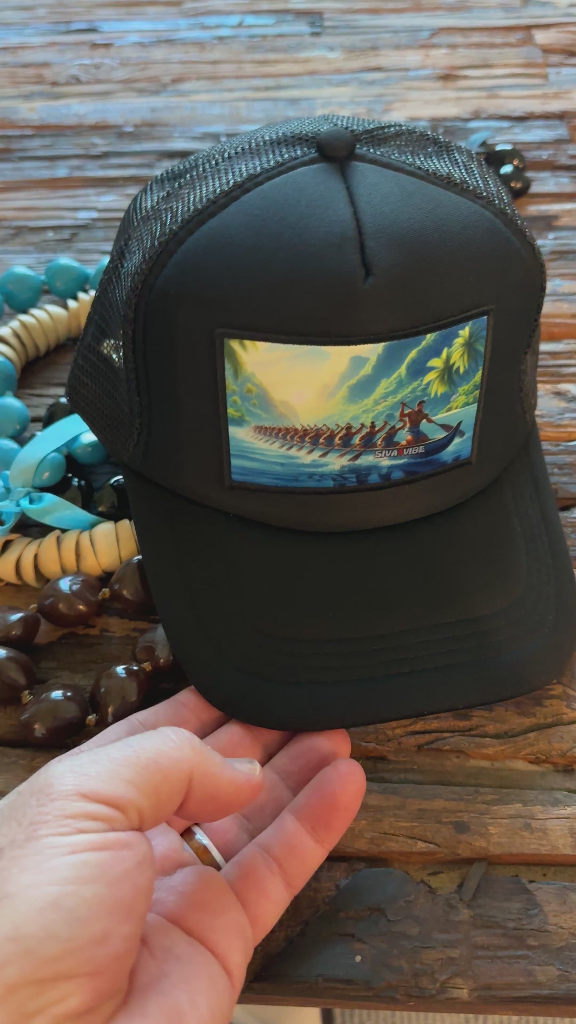 Video of all black Fautasi foam trucker hat by Siva Vibe — showcasing breathable mesh design and bold island style