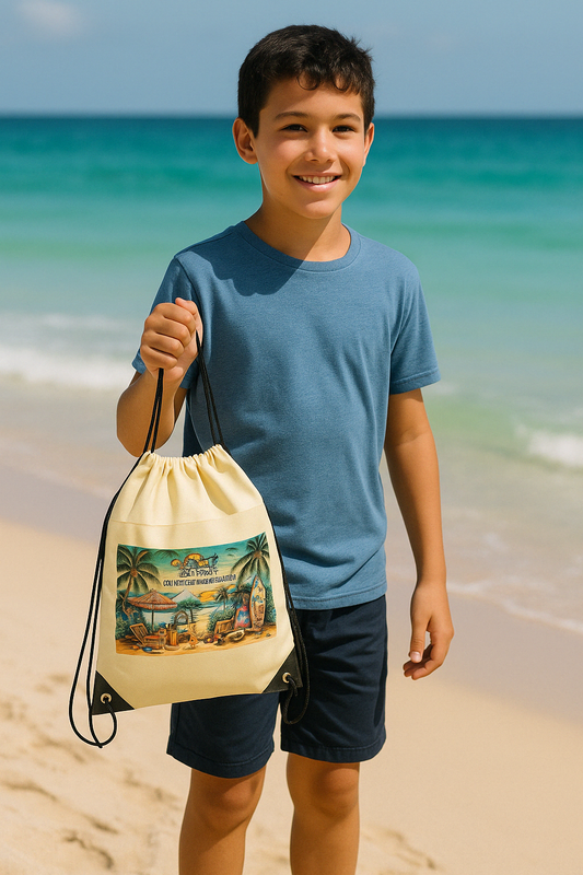 Lifestyle photo of boy holding Siva Vibe drawstring backpack on the beach — island-ready gear for all ages