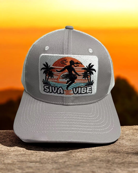 Front view of Siva Vibe gray cotton trucker hat with embroidered island logo — clean, breathable, everyday island wea